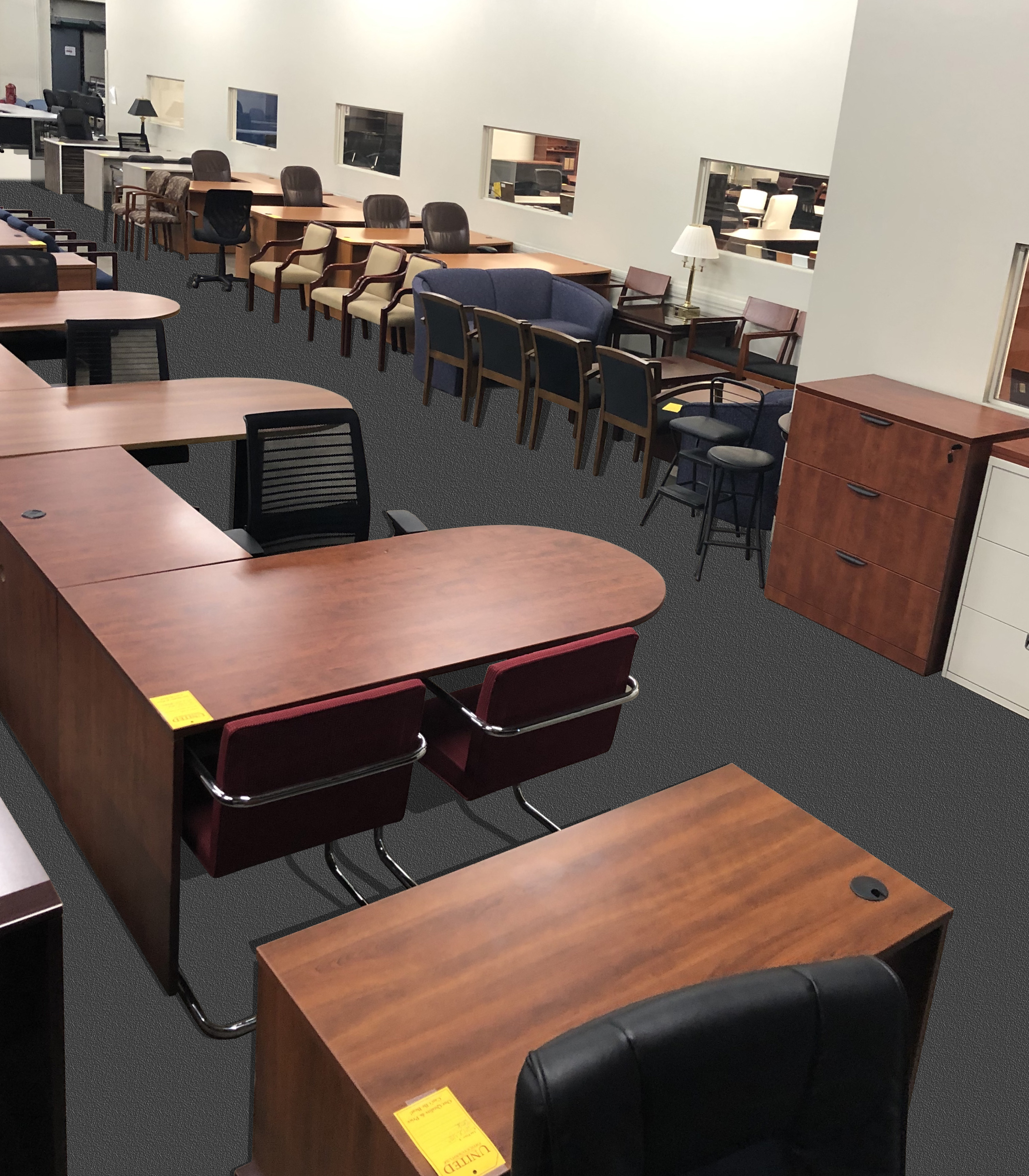 https://corporateofficefurniturelouisville.com/wp-content/uploads/2019/10/Pre-owned-Warehouse-Showroom-Student-Desks-L-Desks-Lateral-Files-Metal-Laminate-Reception-Furniture-and-more.jpg
